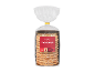 Pachet de biscuiți cu unt cu decorațiuni de zahăr și etichetă festivă.