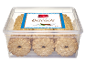 Biscuiți de cocos într-un recipient transparent din plastic, cu eticheta 