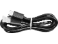 Cablu negru USB-A la USB-C, înfășurat și asigurat cu un colier alb.