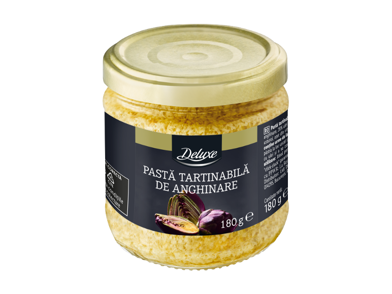 Borcan de sticlă cu pastă de anghinare, etichetă neagră și capac auriu.