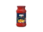 Borcan de sos roșu pentru paste cu etichetă ce arată paste, bacon și textul „Pastasauce alla Toscana with smoked bacon”.