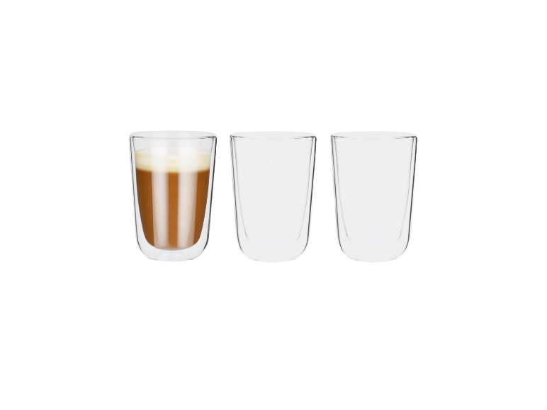 Trei pahare cu perete dublu, unul cu cafea și spumă, două goale.