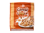 Ambalaj de cereale sub formă de biscuiți cu bucăți de ciocolată și lapte.