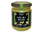 Borcan de cremă de fistic cu fistic împrăștiat și textul „PISTACHIO SPREAD”.
