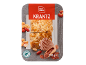 Bucăți de prăjitură cu nuci, glazură de caramel, alune și cacao.