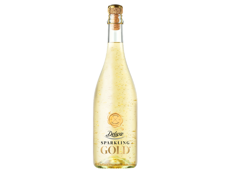 Sticlă aurie de băutură spumantă cu fulgi de aur plutitori și eticheta „Sparkling Gold”.