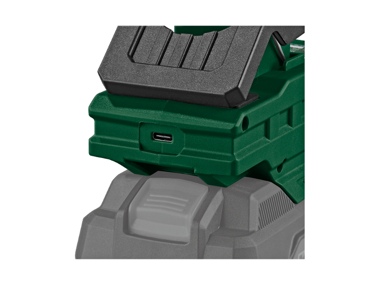 Adaptor USB verde cu port Type-C, montat pe o baterie gri.