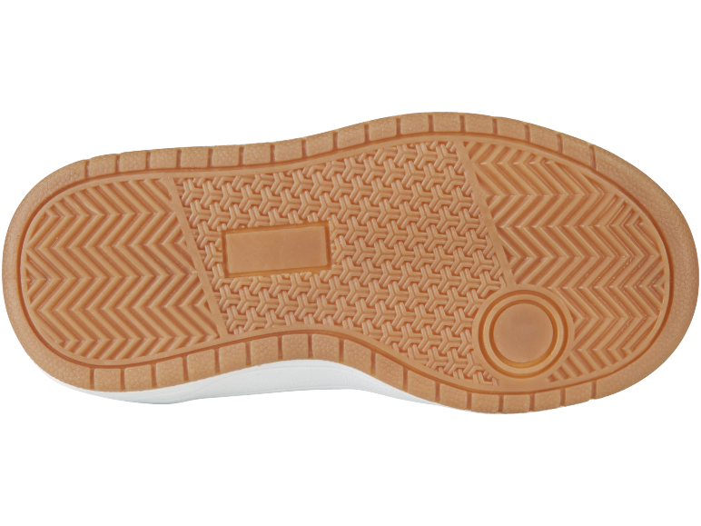 Talpă de cauciuc maro a unui adidaș cu model în zig-zag și geometric.