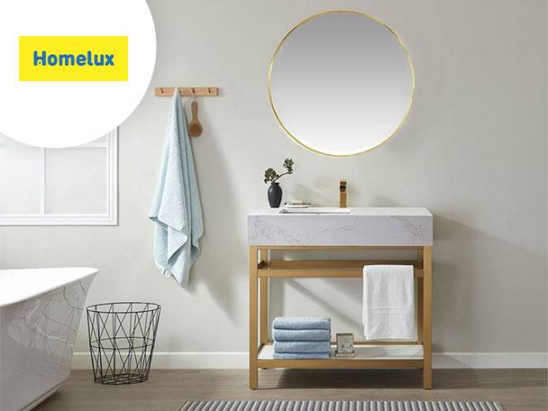 O baie modernă cu o chiuvetă Homelux, oglindă aurie și un raft elegant.