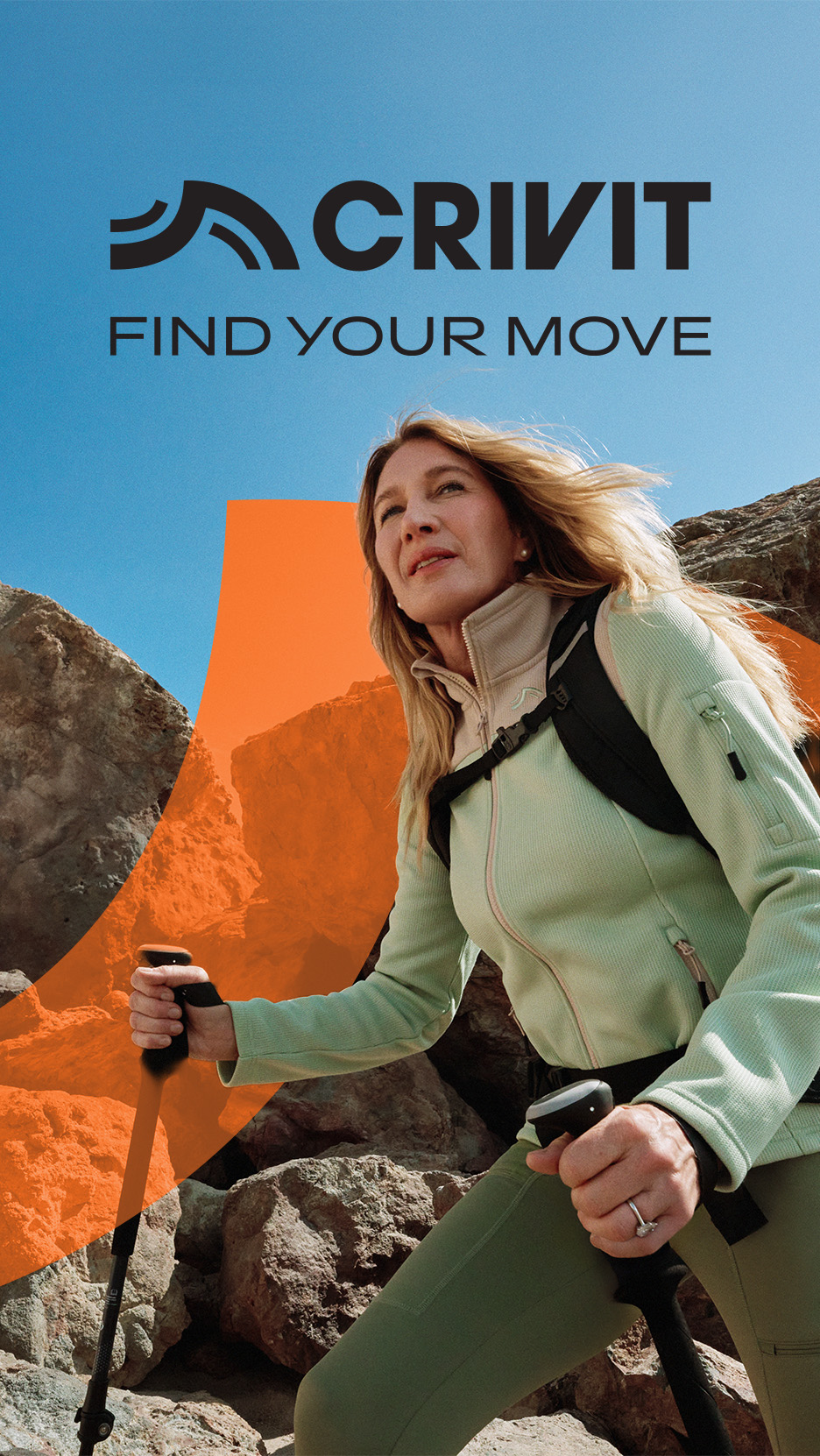 Femeie care face drumeții cu bețe de trekking, purtând o jachetă și pantaloni sport. Slogan: „FIND YOUR MOVE”.