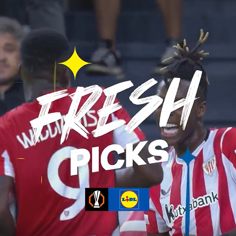 Jucători de fotbal în tricouri roșii și albe cu textul „FRESH PICKS” și logo-ul Lidl.